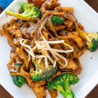 Pad See Ew · Sautéed rice noodles with eggs and broccoli.