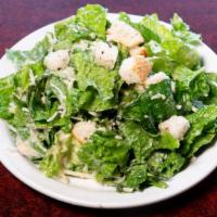 Caesar Salad · Crisp Romaine lettuce with parmesan cheese and croutons.