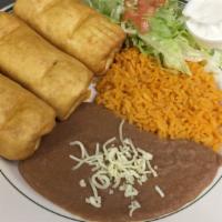Chimichangas · Three flour tortillas filled with chicken, ground beef or al pastor and cheese, then deep fr...