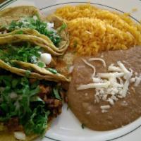 Taco Dinner · Three tacos with your choice of ground beef, chicken or al pastor.
choice of corn or flour t...