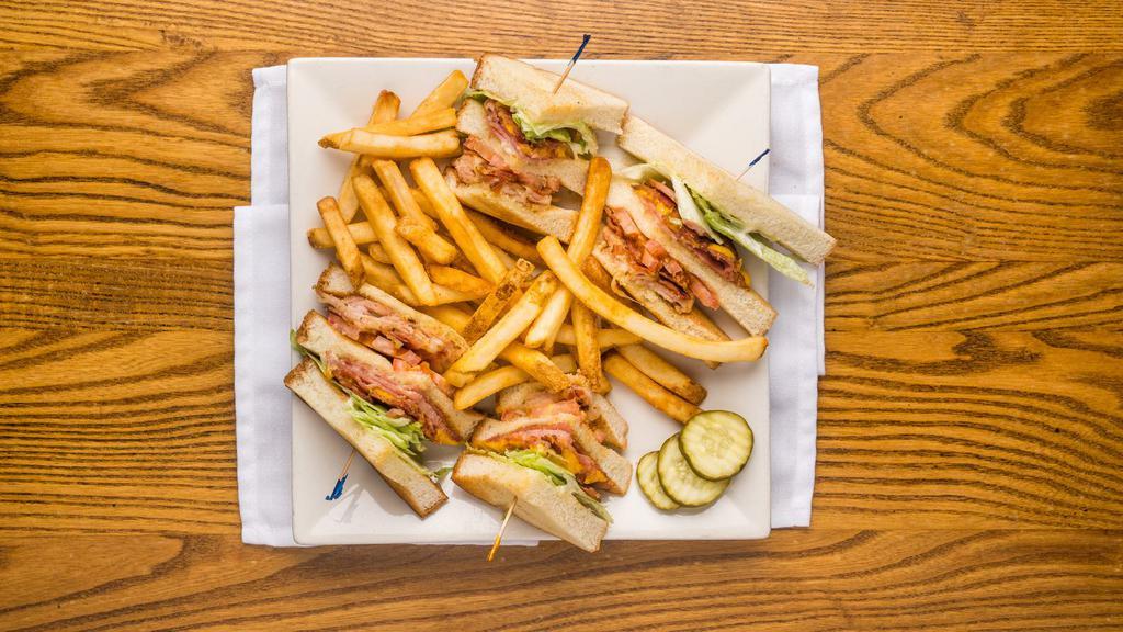 Adagio'S Club Sandwich · Turkey, ham, bacon, lettuce, mayo, tomato, Swiss and American cheeses, Texas toast