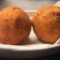 Rellenos · Potato [papa] or cassava [yuca] ball stuffed w/ground beef.