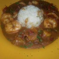 Shrimp Etouffee · Shrimp smothered in a mildly spicy gravy seasoned with Onion, Red & Green Bell Peppers, Cele...