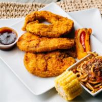 3 Piece Steaked Catfish With Fries · Delicious golden farm raised catfish with bone in.