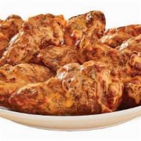 Boom Boom Wings Bone-In Wings · Our traditional bone-in wings oven roasted, and then tossed in boom boom sauce. This sweet, ...