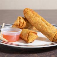 Chicken Egg Roll · A giant egg roll filled with chicken , green onion, celery, cabbage, peanut oil, and Orienta...