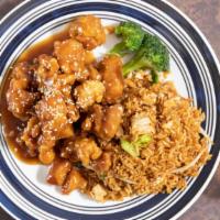 Sesame Chicken · Breaded chicken smothered with a sweet and tangy sesame sauce.