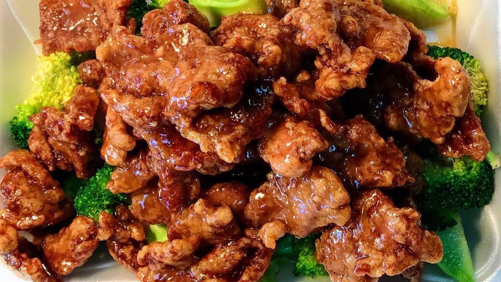General Tso'S Chicken · Spicy. Breaded chicken smothered with a sweet and sour sauce and spicy.