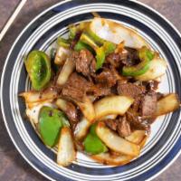 Pepper Steak · Favorite. Beef sautéed with green pepper and onion in a black bean sauce.