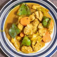Curry Chicken · Spicy. Chicken sauteed with Spanish onion, green pepper and carrots in curry sauce.