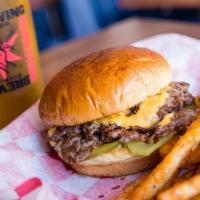 Impossible Burger · Impossible burger patty (vegetarian), american cheese, pickles, grilled onions and dijon mayo.