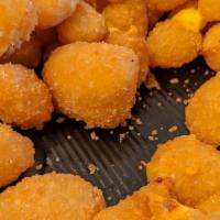 Cheese Curds · Breaded chunks of cheddar cheese/ crispy golden outside, warn gooey inside! Served with ranc...