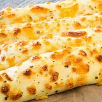Cheese Bread Sticks · Bread Sticks Made Out of Pizza Dough, Topped with Mozzarella Cheese, Side of Marinara