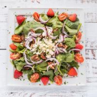 Amazing Spinach Salad · Organic fresh spinach grape tomato, caramelized pecan, fresh strawberry, feta cheese, red on...