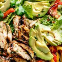 Fajita Salad · Spring mix with chicken breast or shrimp cooked fajita style. Garnished with black beans, av...