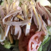 Chef'S Salad · Turkey, ham, tomatoes, onions, cucumbers, hard boiled egg, swiss and American cheese.