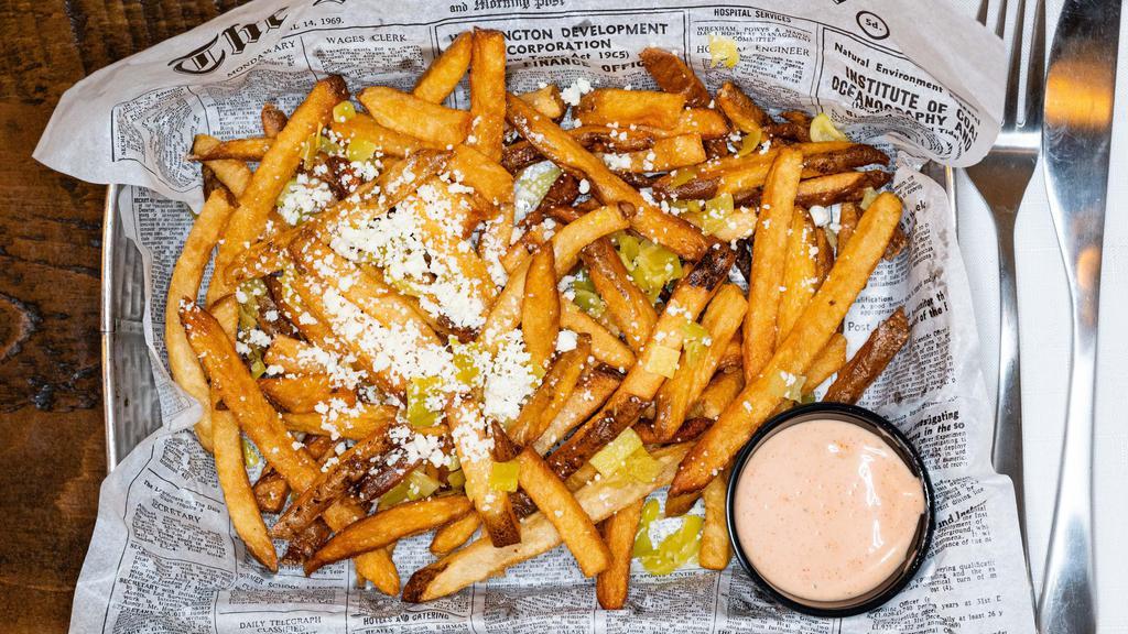O&L Feta Fries · Topped with feta cheese and pepperoncini.