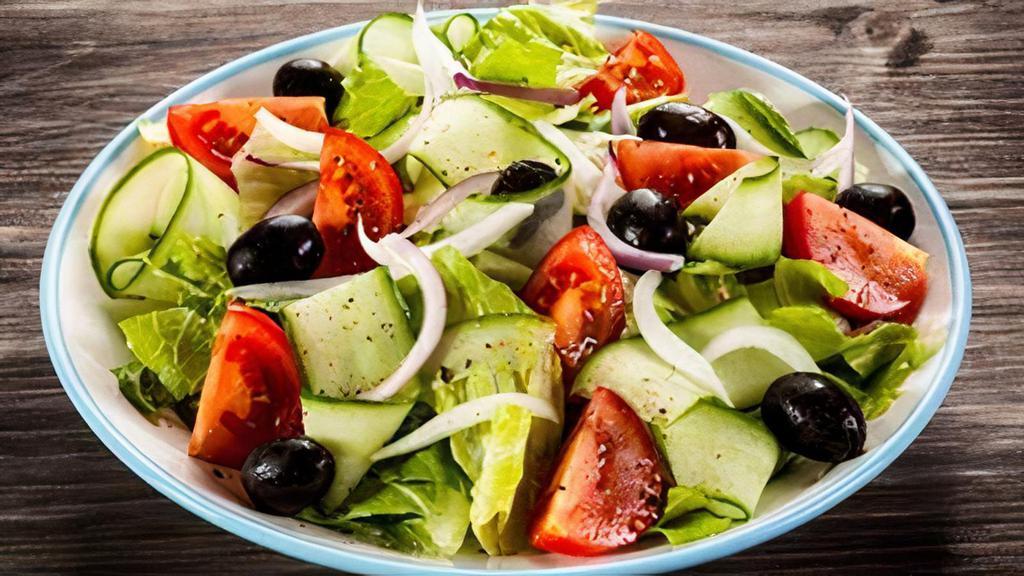 Greek Salad · Includes lettuce, cucumber, tomatoes, onions, Kalamata olives and feta cheese with our homemade salad dressing.