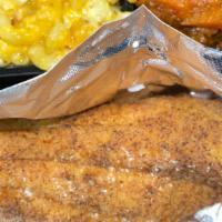 Fried Catfish · Large Fillet, comes with two sides and one honey butter cornbread.