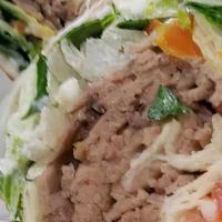 Lamb Gyro · Marinated lamb pieces, seasoned to perfection, served in a pita with lettuce, tomatoes, and ...