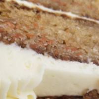 Carrot Cake · Homemade carrot cake, sprinkled walnuts with a buttercream icing..