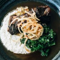 Short Ribs · brown butter grits, braised kale, crispy onions