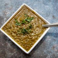 Dal Makhani · Creamed lentils prepared with butter and a touch of spice.
