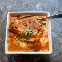 Chicken Tikka Masala · Lightly broiled chicken cooked in a savory tomato, onion and butter sauce.