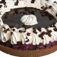 Black Raspberry Pie · Black raspberry chip ice cream, bittersweet topping, and chocolate curls, in a chocolate pie...