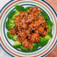 Sesame Chicken · Served with roast pork or chicken fried rice and egg roll or spring roll.