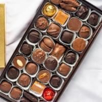 Md Deluxe Assortment (1 Pound) · Our most popular gift box! One pound (approximately 32 pieces) of our finest chocolates. Fro...