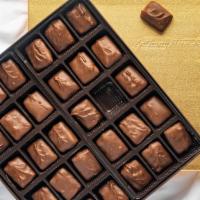14 Oz English Toffee Milk Chocolate · We spend two days creating every piece of this candy! Rich almond butter toffee handmade and...