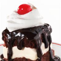Frisch'S Hot Fudge Cake · Vanilla Ice Cream sandwiched between two hot fudge cakes, smothered with hot fudge and toppe...