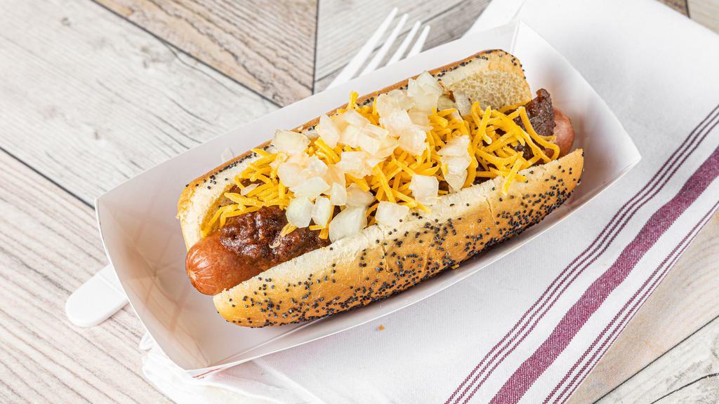 Chili Dawg - 6 Inch · Steamed poppy seed bun with a ladle of our texas (no bean) chili, shredded cheddar and/or chopped sweet onions.