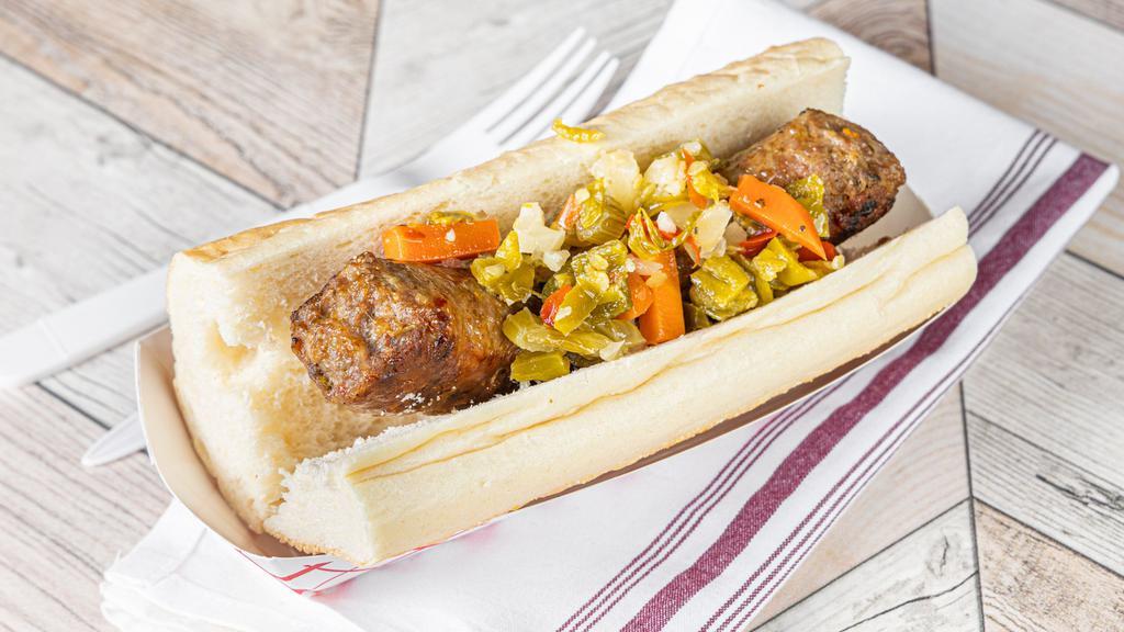 Italian Sausage · Char-grilled slightly spicy Italian sausage served on fresh-baked Turano french bread.