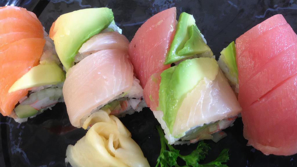 Rainbow Roll (8) · Raw fish. Crab stick, avocado, cucumber with a variety of fish and avocado on top.