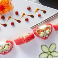 Forever Hot (8) · Raw fish. Spicy tuna, spicy salmon and asparagus inside topped with tuna and wasabi sauce an...