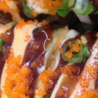Dynamite Roll (10) · Déep fried salmon cheese, snow peas with three kinds of house special sauces, scallion, and ...