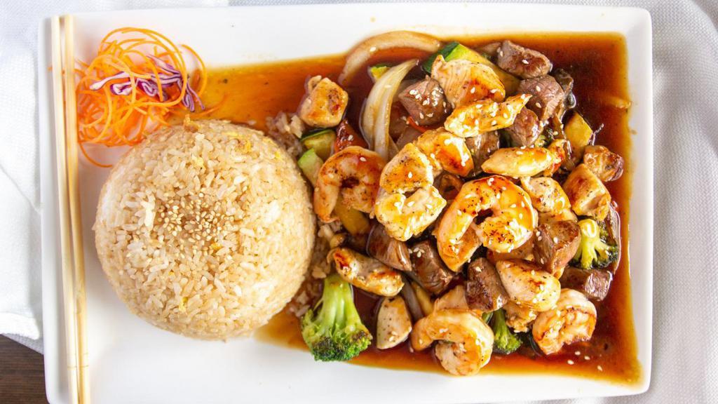 Imperial (Chicken, Steak & Shrimp) · Served with broccoli zucchini onion mushroom and fried rice or white rice.
