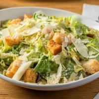 Caesar Salad · Romaine, garlic parmesan croutons and shaved parmesan with Caesar dressing.