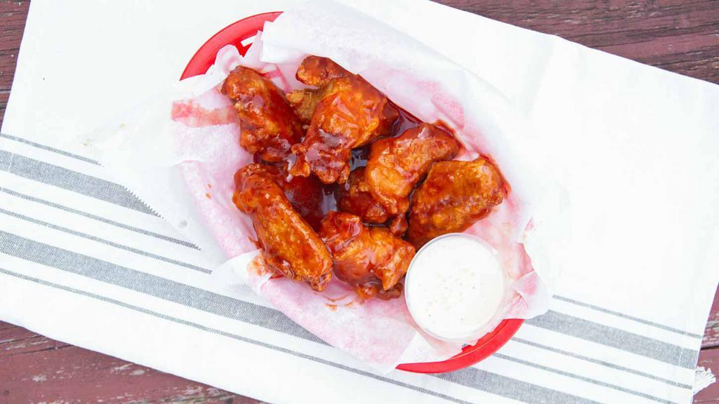 Wings (Single Order) · Eight ounces or seven wings.