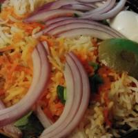 Chicken Dum Biryani · Our hyderabadi dum ka biryani is immaculately crafted for your culinary indulgence marinated...