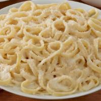 Fettuccine Alfredo  · A creamy roasted garlic Alfredo made simply with cream, butter and Parmesan cheese. Best ord...