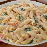 Penne Diavolo  · Spinach and sun dried tomatoes in a spicy cream sauce seasoned with garlic and red pepper fl...