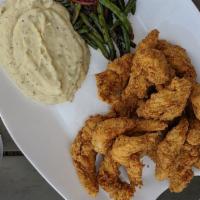 Chicken Tenders Family Meal + Bread Pudding · 16 pieces of fried chicken tenders with a pint of mashed potatoes, a pint of green beans, an...