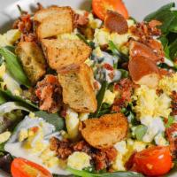 House Salad · Gluten free available. Mixed greens, egg, bacon, cherry tomatoes pretzel croutons.