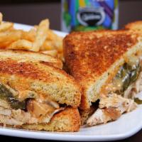 Chupacabra · Chipotle chicken, grilled jalapeños, grilled onions muenster cheese, spicy aioli, jalapeño b...