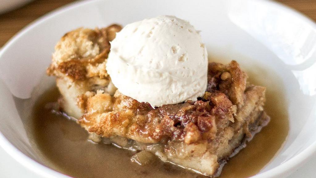 Bread Pudding · Bourbon-brown sugar syrup, house-made whipped cream.