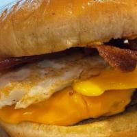 Rebel Cheeseburger With Bacon & Egg · Fried Egg & Bacon Strips with Cheese