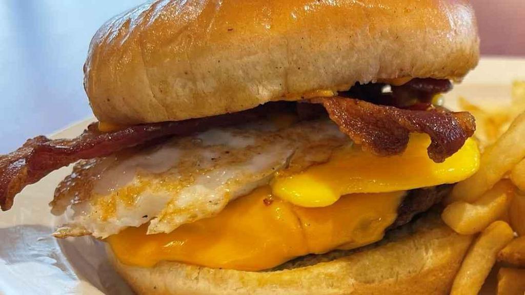 Rebel Cheeseburger With Bacon & Egg · Fried Egg & Bacon Strips with Cheese